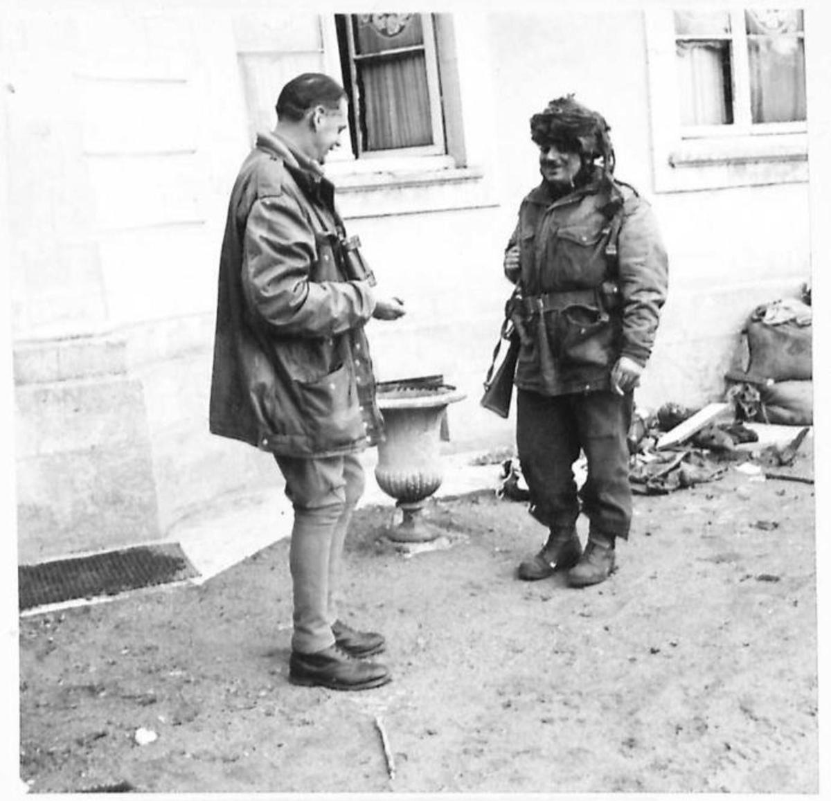 BRITISH FORCES DURING THE NORMANDY CAMPAIGN 1944 - Major-General R N Gale, GOC 6th Airborne Division, talking to Lieutenant W G Rothschild outside his headquarters in Ranville, 10/11 June 1944 ,