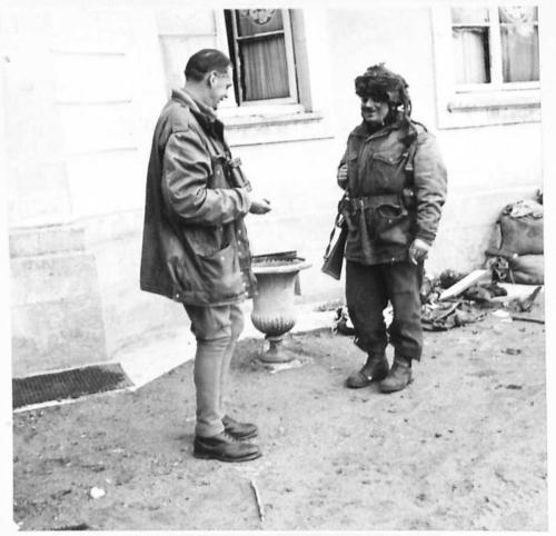 BRITISH FORCES DURING THE NORMANDY CAMPAIGN 1944 - Major-General R N Gale, GOC 6th Airborne Division, talking to Lieutenant W G Rothschild outside his headquarters in Ranville, 10/11 June 1944 ,